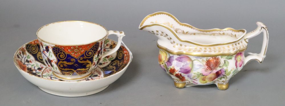 Two Royal Worcester leaf jugs, a Royal Doulton jug, a Belleek posy vase and a 19th century Derby cup and saucer, tallest 15cm